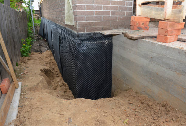 Happy homeowners after waterproofing job in South Charleston